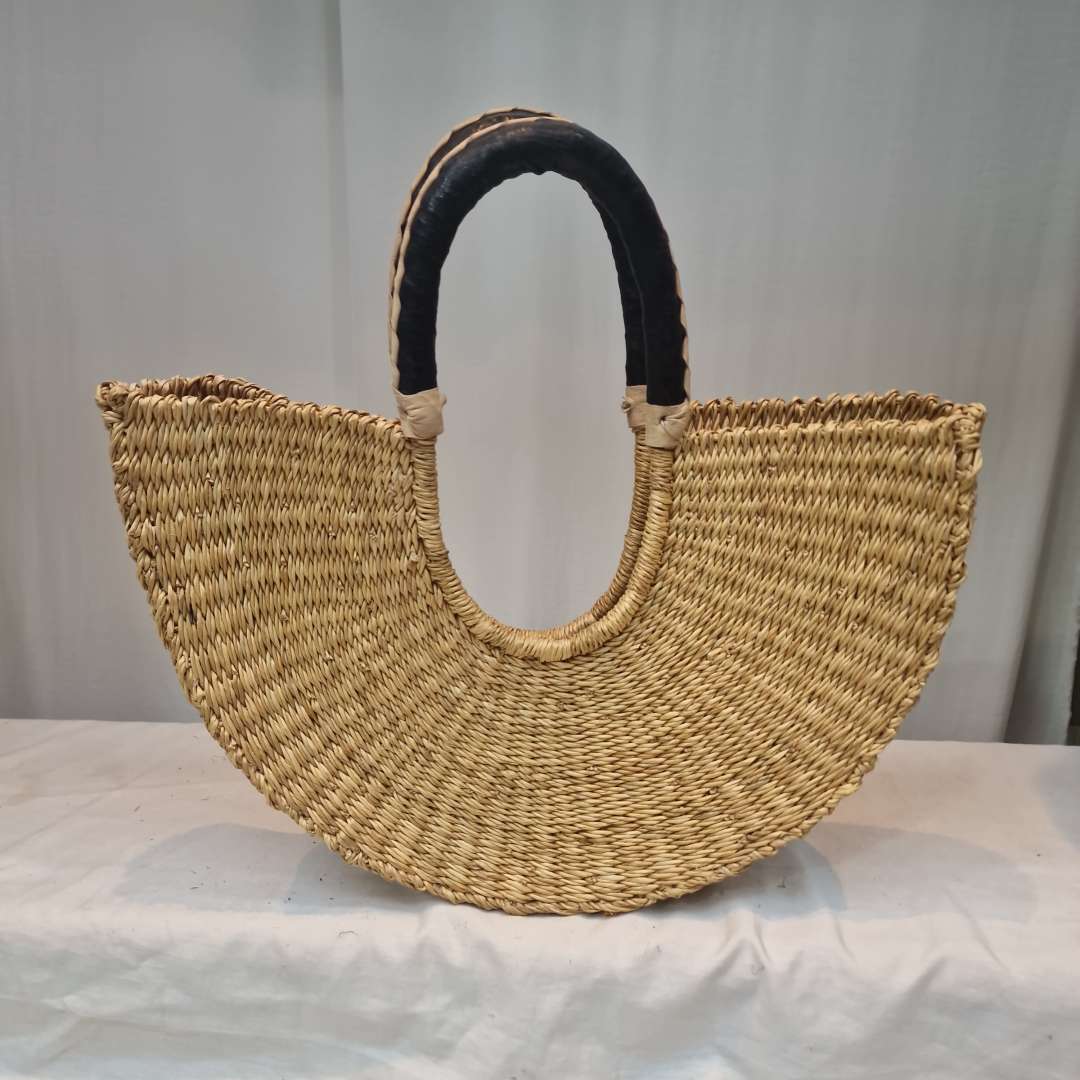 handmade-straw-tote-bag-with-black-handles